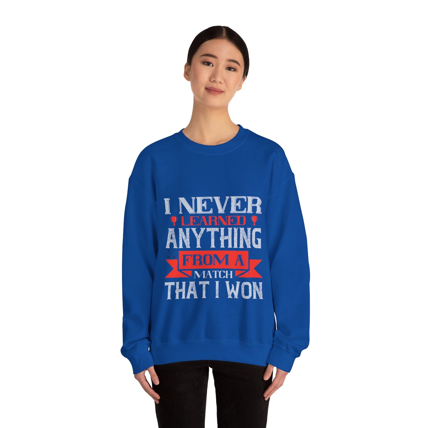 I never learned anything from a match that I won-01 — Unisex Heavy Blend Crewneck (G18000)