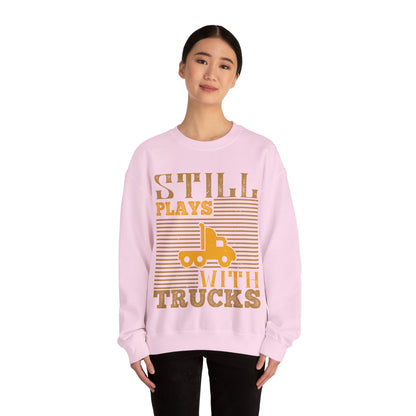 Still Plays With Trucks (2) — Unisex Heavy Blend Crewneck (G18000)