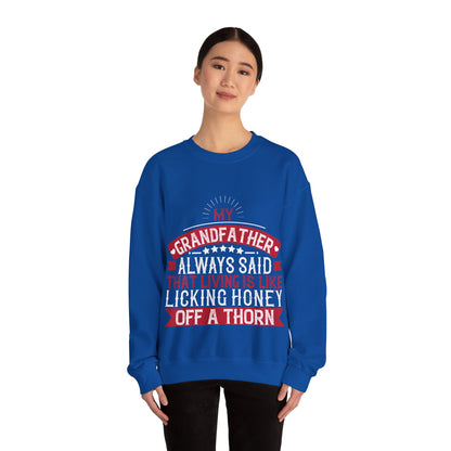 My grandfather always said that living is like licking honey off a thorn-01 — Unisex Heavy Blend Crewneck (G18000)