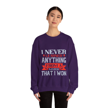 I never learned anything from a match that I won-01 — Unisex Heavy Blend Crewneck (G18000)