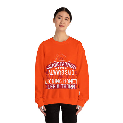 My grandfather always said that living is like licking honey off a thorn-01 — Unisex Heavy Blend Crewneck (G18000)