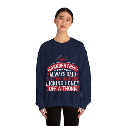 My grandfather always said that living is like licking honey off a thorn-01 — Unisex Heavy Blend Crewneck (G18000)