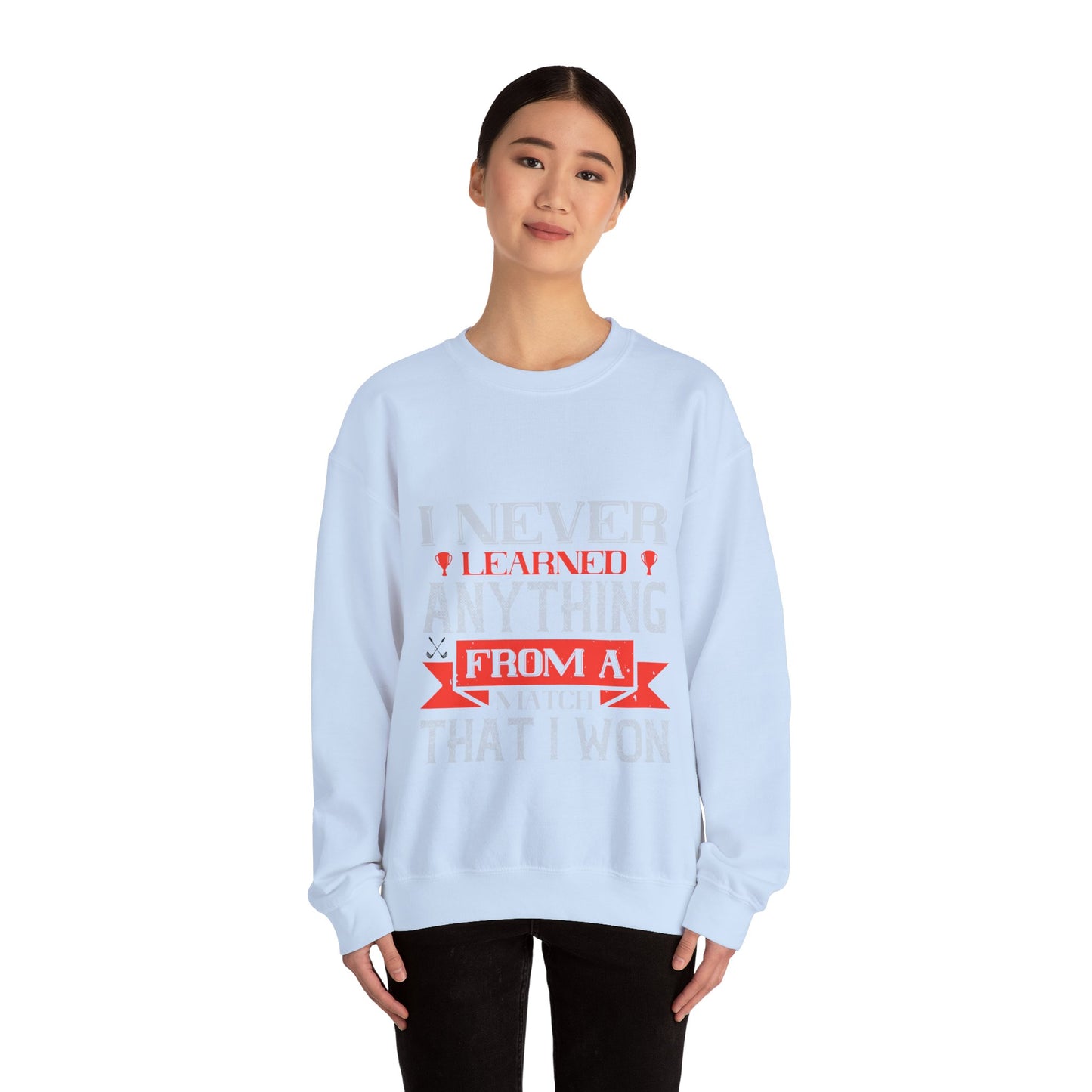 I never learned anything from a match that I won-01 — Unisex Heavy Blend Crewneck (G18000)