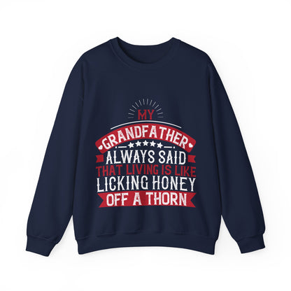 My grandfather always said that living is like licking honey off a thorn-01 — Unisex Heavy Blend Crewneck (G18000)