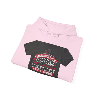 My grandfather always said that living is like licking honey off a thorn-02 — Unisex Heavy Blend Hoodie (G18500)